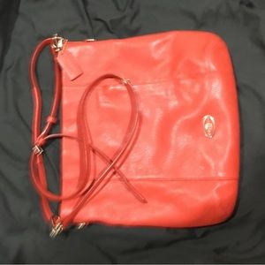 Coach orange Clarke crossbody bag